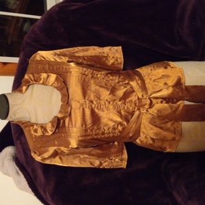 Very dressy brassy gold silky blouse.
